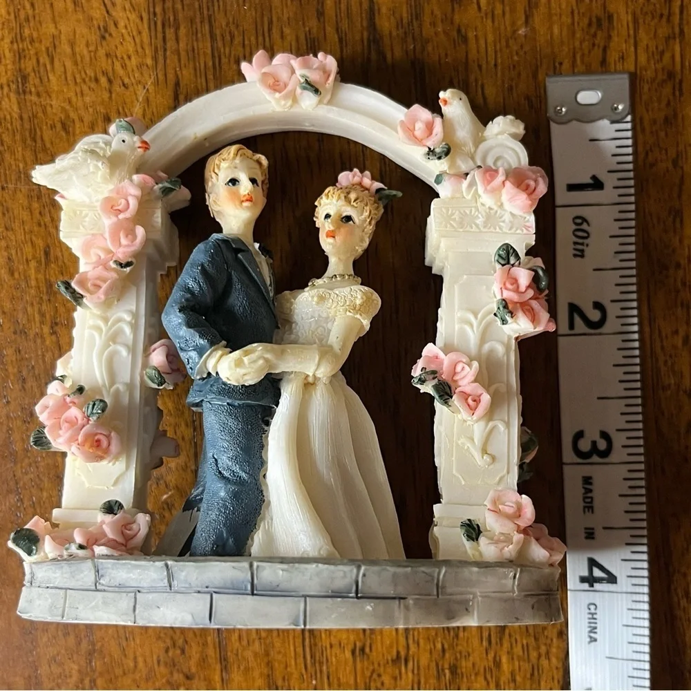 Vintage wedding cake topper. Romantic Wedding Couple Figurine with Pink Roses